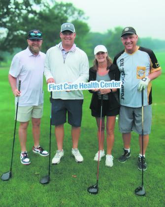 2nd Place – Wells Drinking Well (L-R): Brett Omdahl, Grant Skibicki, Amy Skibicki, Steve Wells.