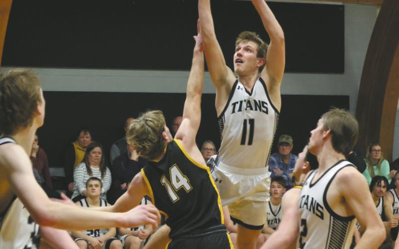 DVE senior Isaac Feltman releases the ball past PRFL defender Luke Shirek. Photo by Jamie Rarick
