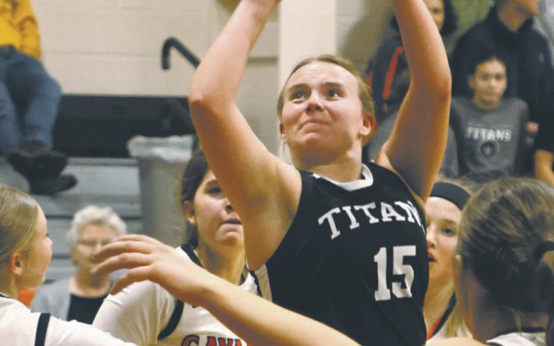 Aleah Pokryzwinski shoots through a crowd in action at Cavalier last week. Photo by Lyle Van Camp