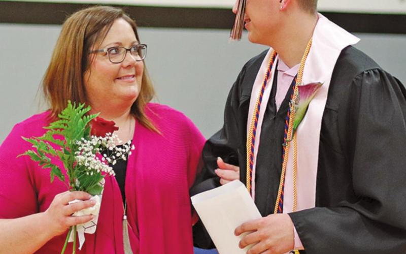 Gage Pollestad is escorted out of the gym by his Mom Lindsay following the Graduation Ceremony. VNV Photo by Lyle Van Camp