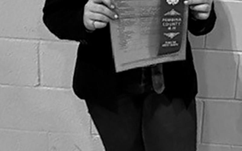Senior speech, Bailey S is proud to display her blue ribbon. Submitted photo