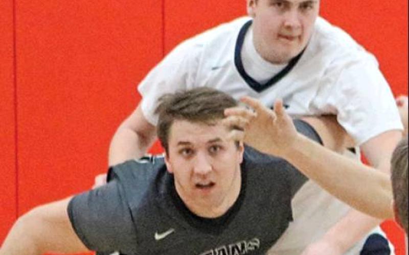 Brendan Durand tries to keep one of the Spartans away from the ball in Finley. Photo submitted by Kerri Stegman, Drayton Public School