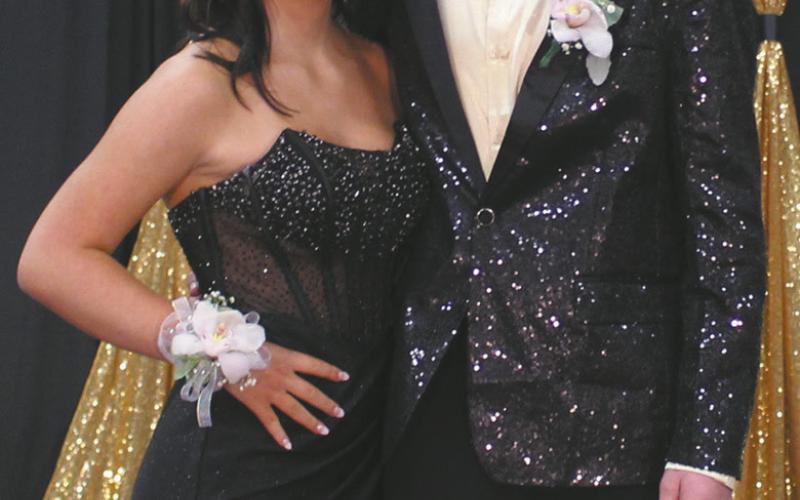 Brayleigh Close escorted by Chey Sehrt