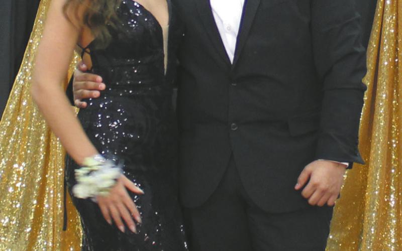 Taylor Hermanson escorted by Raymond Dominguez