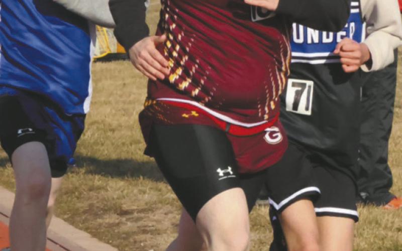 Running the 800m for the Spoilers, Drayton resident Tayden Markel pulls ahead of competitors in his heat. Photo by Jamie Rarick