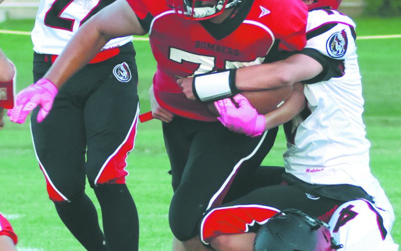 Daniel DeSouza grinds out a few yards in the homecoming game on Friday evening. Photo by Lyle Van Camp