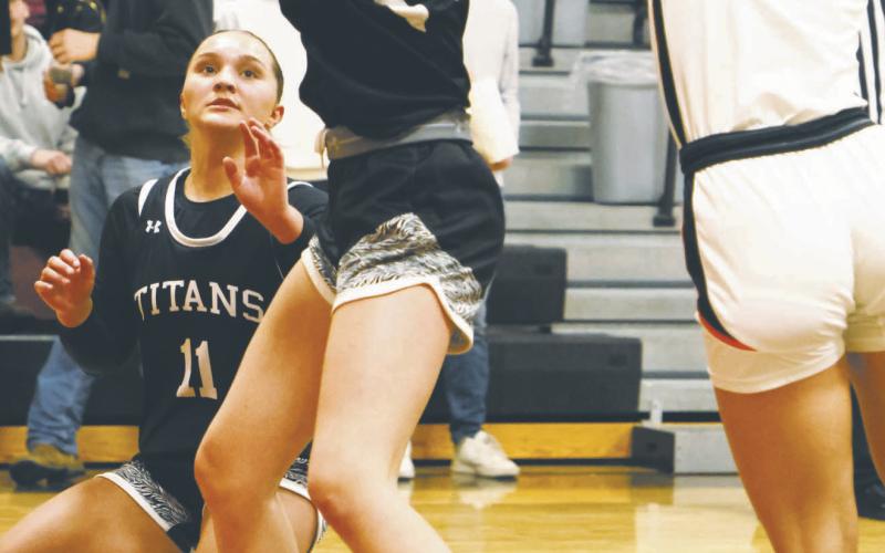 Jaelyn Johnson pulls down a rebound in Cavalier. Photo by Lyle Van Camp