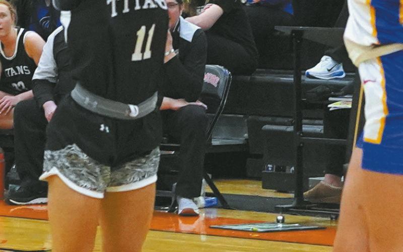 Jacey Nelson goes for the shot against Benson County defense. Photo by Larry Stokke