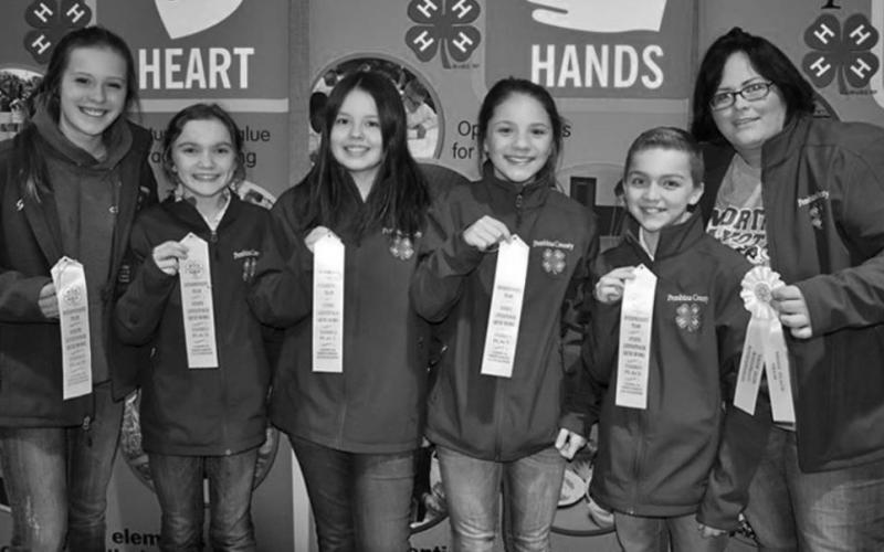 Pictured l to r: Gracee Thorlakson, Remington Larson, Ava Kemnitz, Colbie Furstenau, Wyatt Larson, Coach Tiffany Robinson Photo submitted by Kari Helgoe