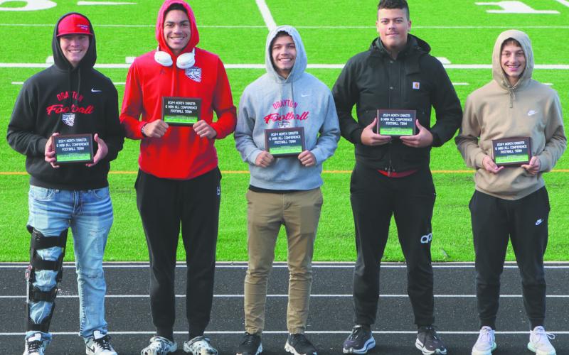 Bombers All-Region team members Hunter Johnson, Mason Pollestad, Trenten Bronson-Keena, and Carter Johnson. Photo by Lyle Van Camp