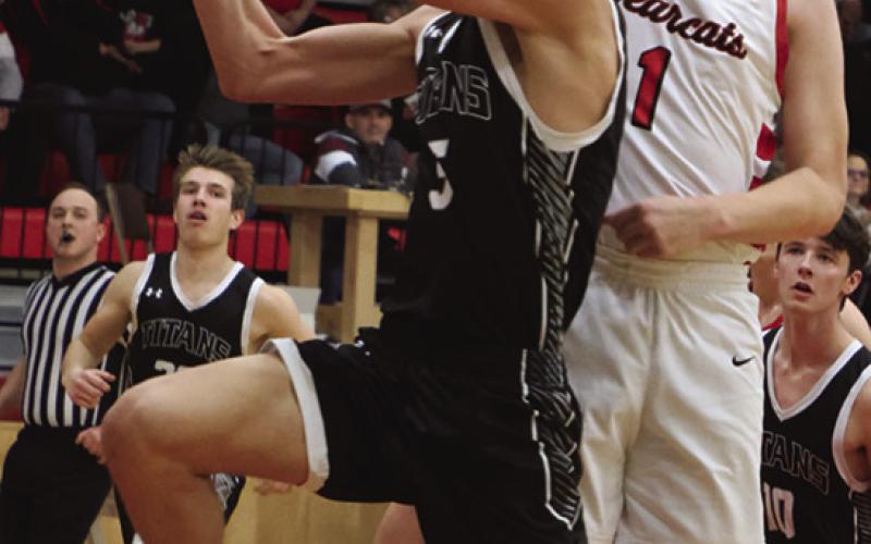 Isaac Feltman shoots past North Star's Brett Dilley.