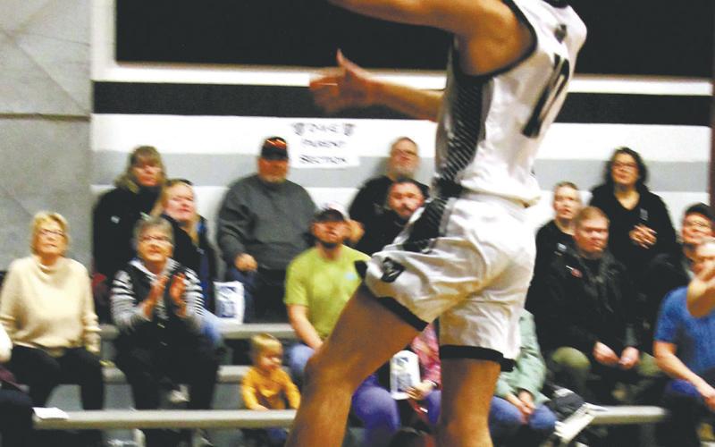 DVE senior Brady Reilly goes up for a layup in Edinburg Feb. 8. Photo by Jamie Rarick