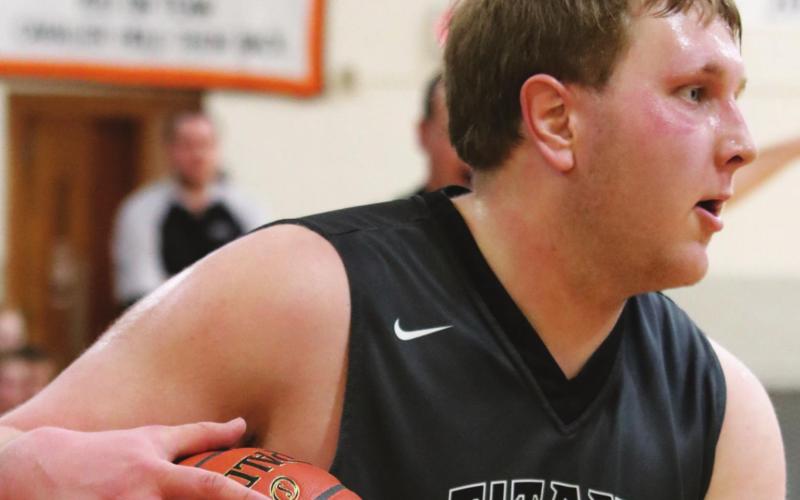 Lukas Pastorek looks for an open teammate. VNV photo by Lyle Van Camp