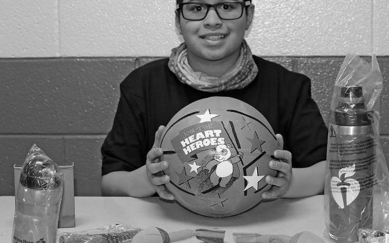 Pictured above: Jerimiah Johnson with some of his thankyou gifts. Photo provided by Drayton Public School