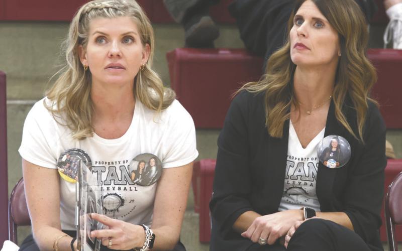 Coaches Fedje and Gullickson keep a close eye on the action. Photo by Lyle Van Camp