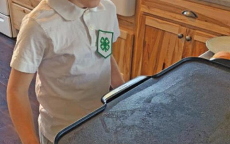 Beau Wieler prepares to demonstate how to make his special egg sandwich. Photo submitted