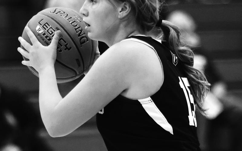 Aleah Pokrzywinski looks for an open Titan in action at Grafton. Photo by Lyle Van Camp.