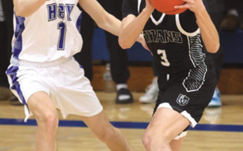 Calvin Otto works the ball past Hillsboro Central Valley's Micah Longthorne. Photo by Lyle Van Camp