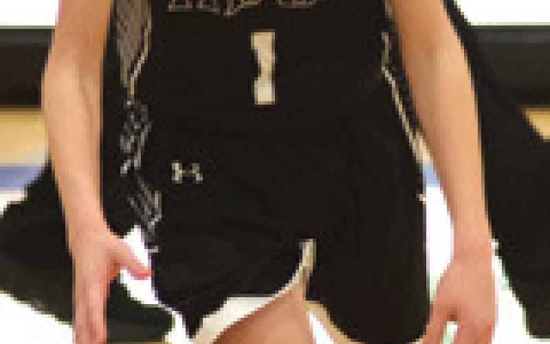 Drew Passa brings the ball up the court at Central Valley. Photo by Lyle Van Camp.