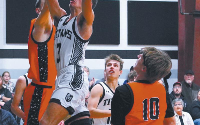 Player of the game, Trenton Keena, in the Titans’ win over Cavalier. Keena finished the game with 20 points and made 8 of 11 free throws. Photo by Larry Stokke