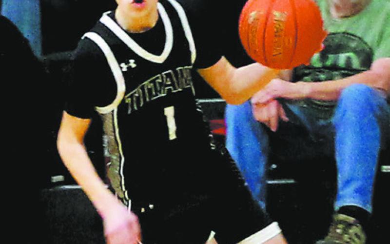 Drew Passa cuts in from the outside towards the basket. Photo by Jamie Rarick