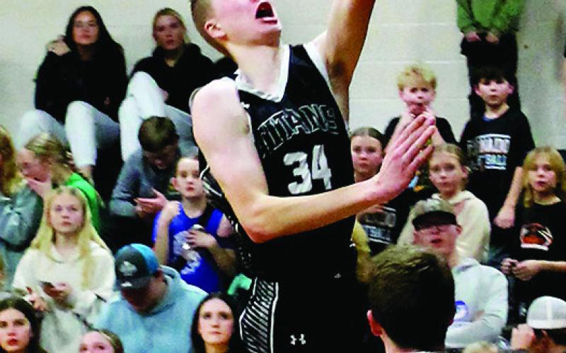 Jack Langerud slices through Cavalier’s defense for the layup. Photo by Jamie Rarick