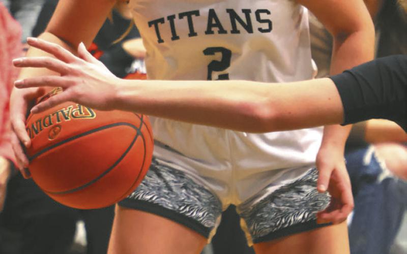 Brooke Gullickson looks for an outlet in action in the play-in game. Photo by Lyle Van Camp.