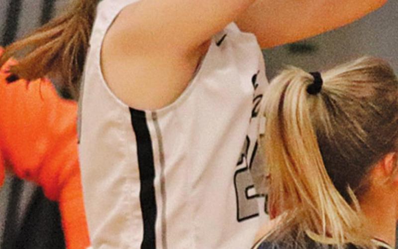 Kiara Aasand goes up for a three point attempt Monday afternoon against North Border in Drayton. VNV Photo by Lesa Van Camp