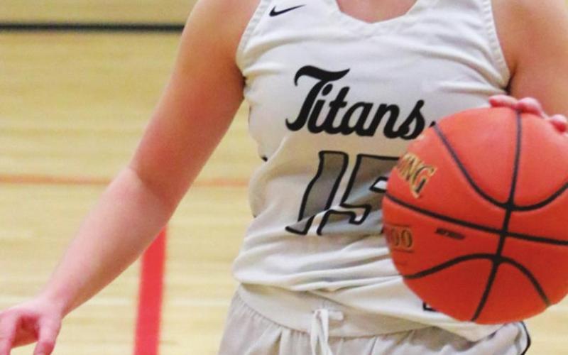 Aleah Pokrzywinski brings the ball up the court in action against North Border. VNV photo by Lyle Van Camp