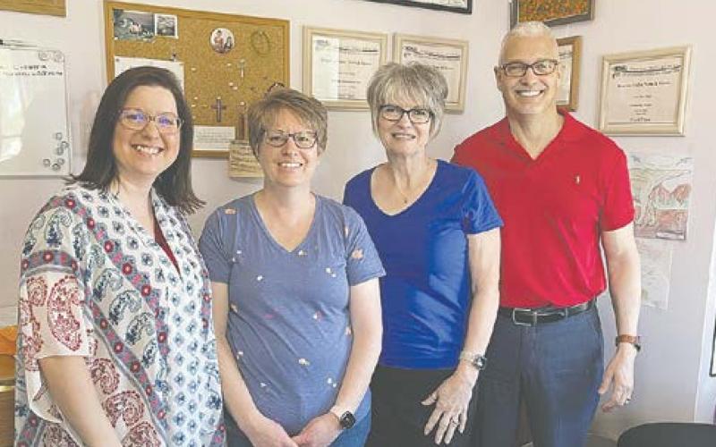 Pictured are Andrea Johnston, Lesa Van Camp, Diane Simmons, and Bob Simmons.