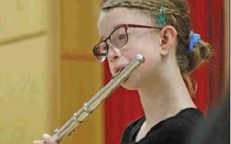 Siobhan Kissee played It Came Upon a Midnight Clear as a flute solo as part of last weeks winter concert. VNV Photo by Lesa Van Camp