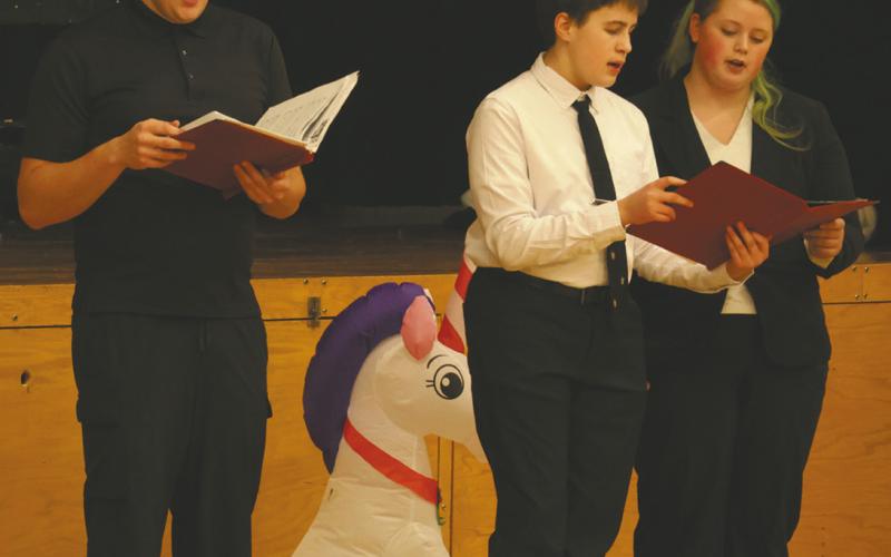 The High School Choir from the left Ian Peterson, Loki Sylskar and Stephanie Kissee. Photo by Lyle Van Camp