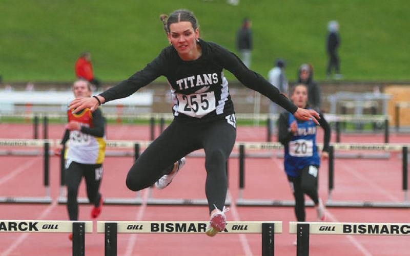 Elizabeth Fedji placed 2nd in 300 hurdles. Photo by Mike Steinfeldt