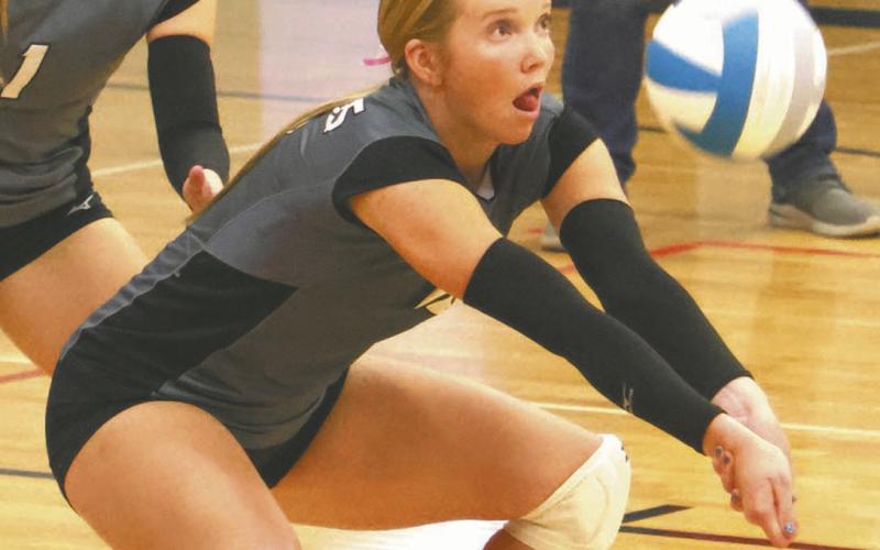 Easton Larson keeps on the ball as she receives a serve in action in Drayton on Tuesday evening of last week. Photo by Lyle Van Camp