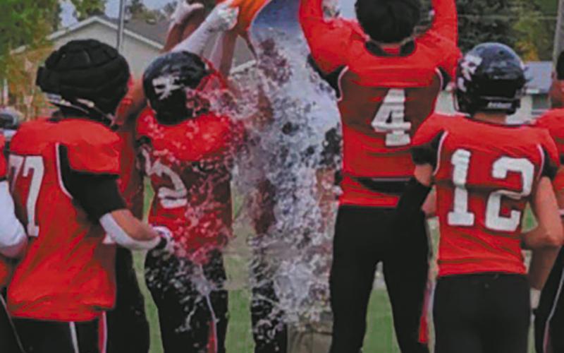 Bombers celebrating after their win. Photo by Jamie Rarick