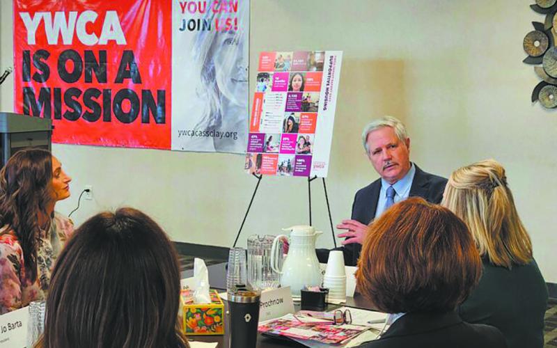 Sen. John Hoeven listens Feb. 20, 2026, as leaders from the YWCA in Fargo discuss helping the homeless. Photo by Jeff Beach/North Dakota Monitor