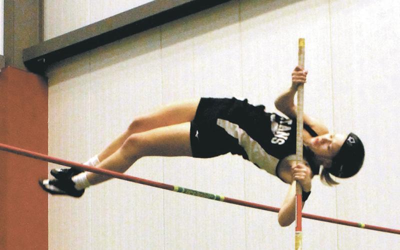 DVE pole vaulter Alyssa Hoyles clears the bar at 10' 6', winning the event and setting new records for both the school and the meet. Photo by Jamie Rarick