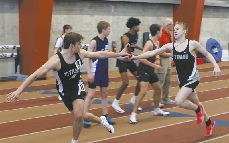 The DVE boys took 2nd in the Mens 4X300 relay. Relay members included Carter Johnson, Shawn Patterson, and Benedict Burrell, pictured passing the baton forward to Teddy Otto. Photo by Jamie Rarick
