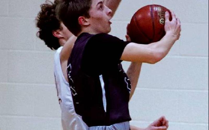 Sam Johnson goes up for two against the Grafton Spoilers last week in the Grafton gym. VNV Photo by Lesa Van Camp