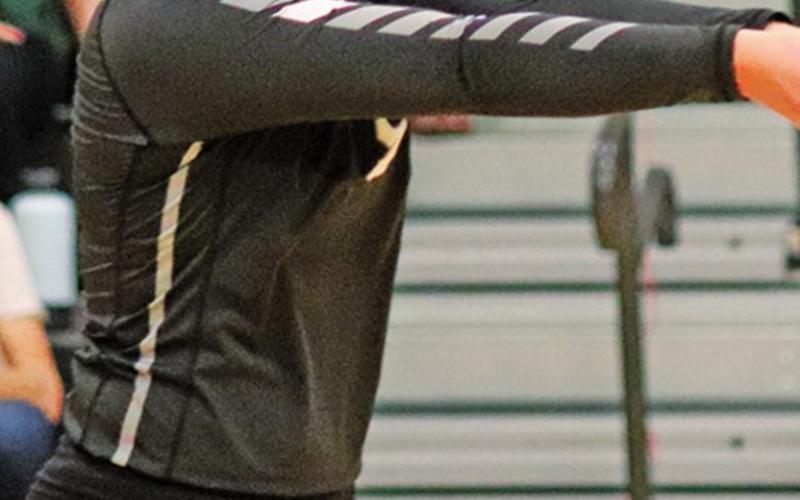 Kasey Stegman calls out to her team mates that shes got the ball in Saturday’s matchup against Larimore in the Drayton gym. VNV Photo by Lesa Van Camp
