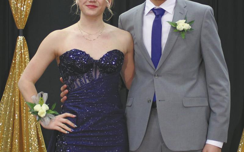 Alyssa Hoyles escorted by Mason Pollestad