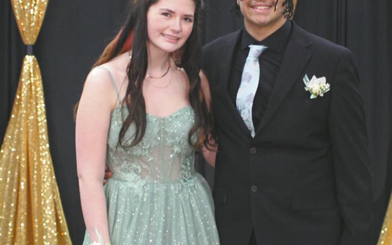Livia Smith escorted by Jerimiah Johnson