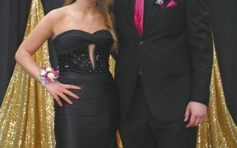 Hailey Riskey escorted by Lincoln Aasand
