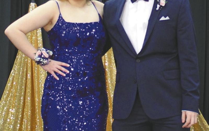Melissa DeSouza escorted by Tayden Markel Photos by Andrea Johnston.