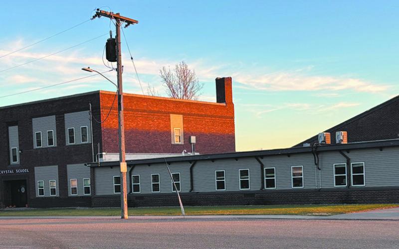 Community voices strong opposition to speculation of Crystal school closing. Photo by Andrea Johnston