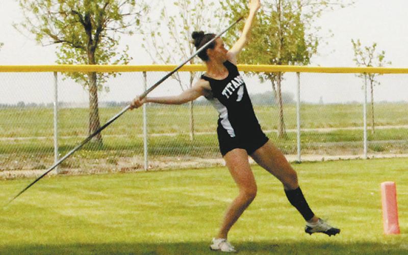 Elizabeth Fedje launches the javelin, winning the regional championship in the event with a distance of 115' 6' at the North East Region Meet. Photo by Jamie Rarick