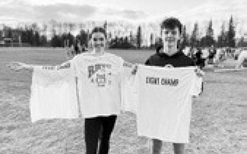 Elizabeth Fedje and Brady Reilly display their event winner’s tee-shirts. Photo submitted by Jeryl Thompson.