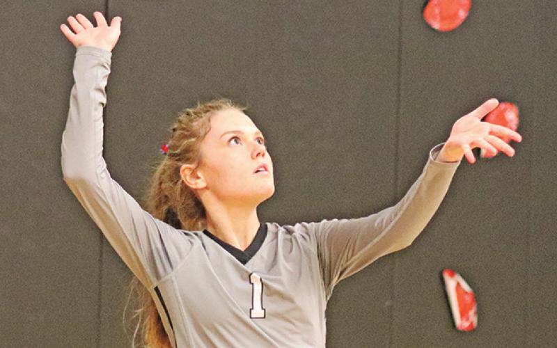 Katelyn Oberg serves the ball to start the volley with MPCG last Thursday evening. VNV Photo by Lesa Van Camp
