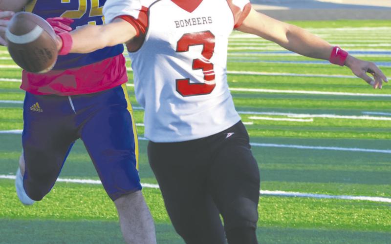 Trenten Bronson-Keena stretchs for the goal line as he scores one of his touchdowns. Photo by Lyle Van Camp