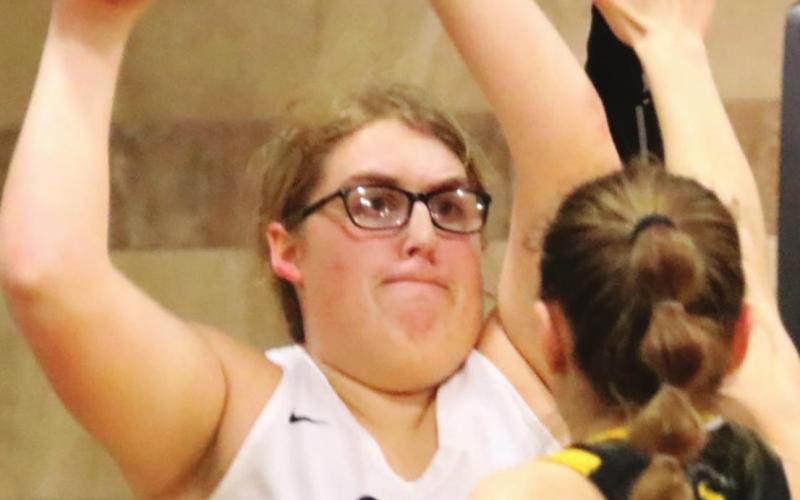 Isabella Douville looks for an open team mate in action against Park River. Photo provided by Drayton Public School Darla Hoyles